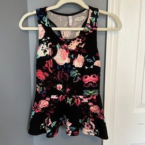 Peplum sleeveless top